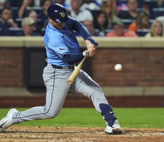 Tampa Bay Rays' Danny Jansen hits a two-run home run during the sixth inning of a baseball game against the New York Mets Friday, June 13, 2025, in New York. (AP Photo/Frank Franklin II)