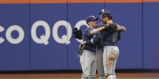 Tampa Bay Rays outfielders Jake Mangum, left, Kameron Misner, center, and Josh Lowe, right, react after defeating the New York Mets in a baseball game Sunday, June 15, 2025, in New York. (AP Photo/Pamela Smith)