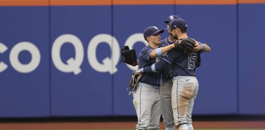 Tampa Bay Rays outfielders Jake Mangum, left, Kameron Misner, center, and Josh Lowe, right, react after defeating the New York Mets in a baseball game Sunday, June 15, 2025, in New York. (AP Photo/Pamela Smith)