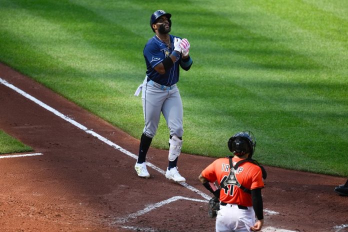 Rays Defeat Orioles 11-3 Tampa Bay Rays' Yandy Diaz, left, celebrates his three-run home run during the fourth inning of a baseball game as Baltimore Orioles catcher Chadwick Tromp looks on at right, Saturday, June 28, 2025, in Baltimore. (AP Photo/Nick Wass)