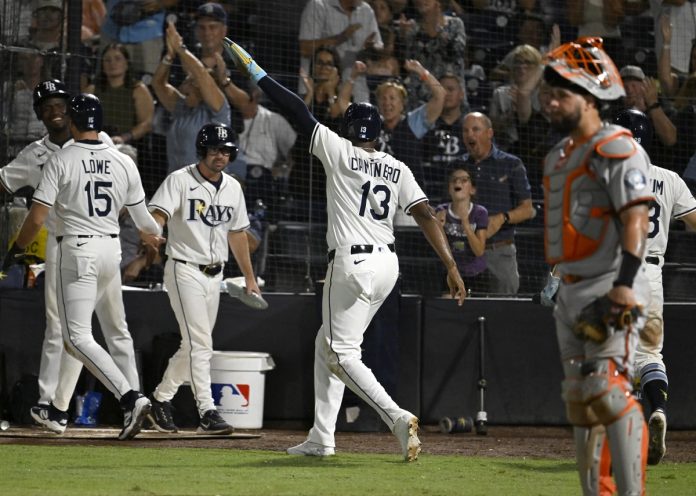 Rays Defeat Orioles 12-8 Tampa Bay Rays' Josh Lowe (15) and Junior Caminero (13) celebrate after scoring on a Jonathan Aranda single during the seventh inning of a baseball game against the Baltimore Orioles, Wednesday, June 18, 2025, in Tampa, Fla. (AP Photo/Jason Behnken)
