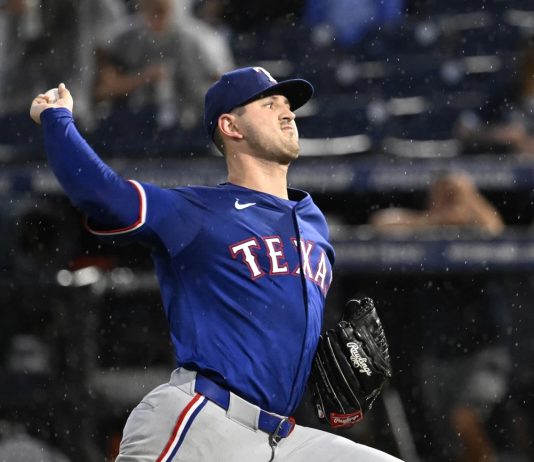 Texas Rangers pitcher Tyler Mahle throws during the second inning of a baseball game against the Tampa Bay Rays, Tuesday, June 3, 2025, in Tampa, Fla. (AP Photo/Jason Behnken)