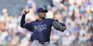 Tampa Bay Rays starting pitcher Taj Bradley throws during the first inning of a baseball game against the Kansas City Royals, Tuesday, June 24, 2025, in Kansas City, Mo. (AP Photo/Charlie Riedel)