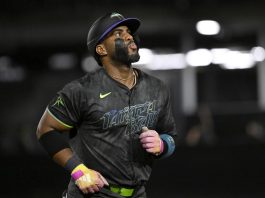 Tampa Bay Rays' Yandy Díaz rounds the bases after his home run during the fifth inning of a baseball game against the Detroit Tigers, Friday, June 20, 2025, in Tampa, Fla. (AP Photo/Jason Behnken)