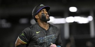 Tampa Bay Rays' Yandy Díaz rounds the bases after his home run during the fifth inning of a baseball game against the Detroit Tigers, Friday, June 20, 2025, in Tampa, Fla. (AP Photo/Jason Behnken)