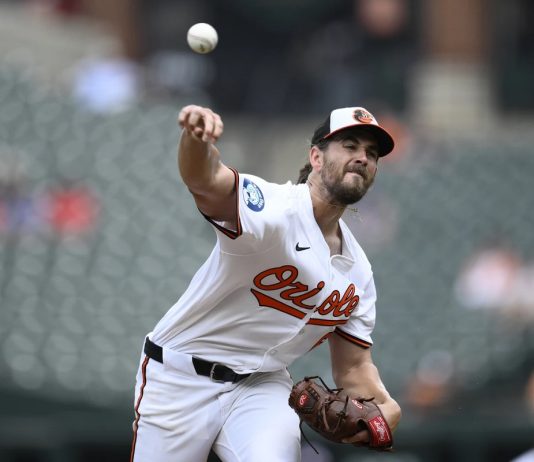 Baltimore Orioles starting pitcher Dean Kremer throws during the first inning of a baseball game against the Tampa Bay Rays, Sunday, June 29, 2025, in Baltimore. (AP Photo/Nick Wass)