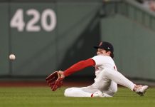 Boston Red Sox outfielder Roman Anthony makes the catch on a fly out by Tampa Bay Rays' Jonathan Aranda during the sixth inning of a baseball game at Fenway Park, Tuesday, June 10, 2025, in Boston. (AP Photo/Charles Krupa)