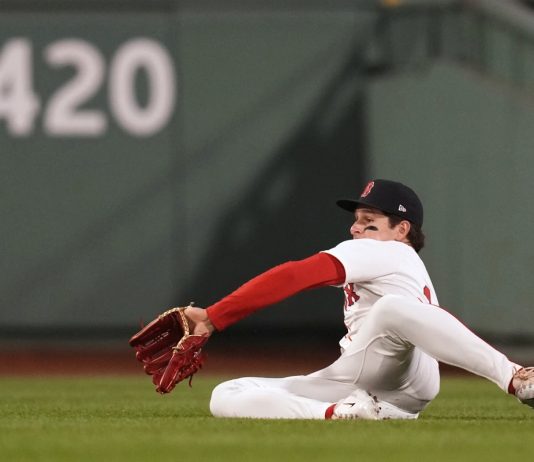 Boston Red Sox outfielder Roman Anthony makes the catch on a fly out by Tampa Bay Rays' Jonathan Aranda during the sixth inning of a baseball game at Fenway Park, Tuesday, June 10, 2025, in Boston. (AP Photo/Charles Krupa)