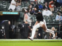 Baltimore Orioles’ Ramon Laureano advances toward home plate to score on a throwing error by Tampa Bay Rays catcher Danny Jansen during the third inning of a baseball game, Friday, June 27, 2025, in Baltimore. (AP Photo/Stephanie Scarbrough)