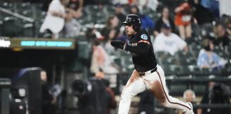 Baltimore Orioles’ Ramon Laureano advances toward home plate to score on a throwing error by Tampa Bay Rays catcher Danny Jansen during the third inning of a baseball game, Friday, June 27, 2025, in Baltimore. (AP Photo/Stephanie Scarbrough)