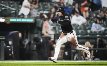 Baltimore Orioles’ Ramon Laureano advances toward home plate to score on a throwing error by Tampa Bay Rays catcher Danny Jansen during the third inning of a baseball game, Friday, June 27, 2025, in Baltimore. (AP Photo/Stephanie Scarbrough)