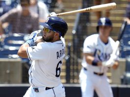 Tampa Bay Rays' Jonathan Aranda lines an RBI single off Miami Marlins pitcher Edward Cabrera during the first inning of a baseball game Friday, June 6, 2025, in Tampa, Fla. (AP Photo/Chris O'Meara)