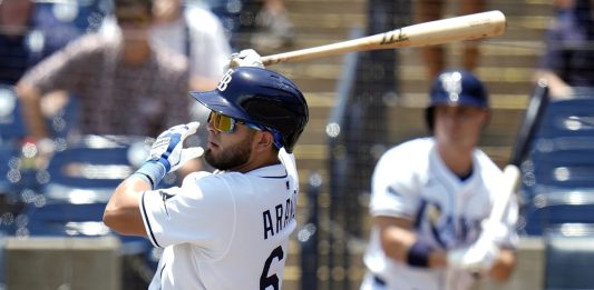 Tampa Bay Rays' Jonathan Aranda lines an RBI single off Miami Marlins pitcher Edward Cabrera during the first inning of a baseball game Friday, June 6, 2025, in Tampa, Fla. (AP Photo/Chris O'Meara)
