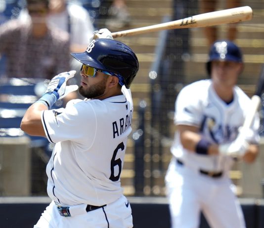 Tampa Bay Rays' Jonathan Aranda lines an RBI single off Miami Marlins pitcher Edward Cabrera during the first inning of a baseball game Friday, June 6, 2025, in Tampa, Fla. (AP Photo/Chris O'Meara)