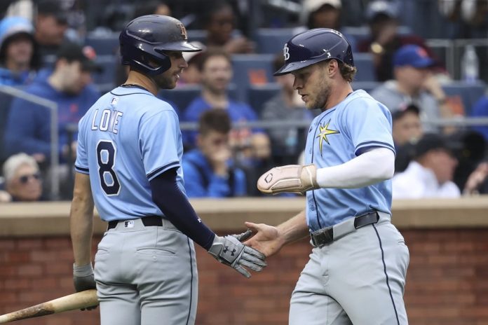 Rays defeat Mets 8-4 Tampa Bay Rays' Brandon Lowe, left, and Taylor Walls, right, react after Walls scored on a single hit by Josh Lowe during the third inning of a baseball game against the New York Mets Saturday, June 14, 2025, in New York. (AP Photo/Pamela Smith)