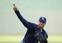 Rasmussen during the second inning of a baseball game, Wednesday, June 25, 2025, in Kansas City, Mo. (AP Photo/Charlie Riedel)