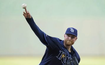 Rasmussen during the second inning of a baseball game, Wednesday, June 25, 2025, in Kansas City, Mo. (AP Photo/Charlie Riedel)