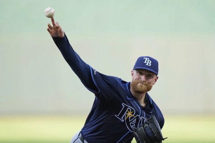 Rays defeat Royals 3-0 Rasmussen during the second inning of a baseball game, Wednesday, June 25, 2025, in Kansas City, Mo. (AP Photo/Charlie Riedel)