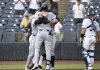 Tampa Bay Rays catcher Matt Thaiss (34) looks away as Detroit Tigers' Parker Meadows celebrates his three-run home run during the ninth inning of a baseball game against the Tampa Bay Rays, Sunday, June 22, 2025, in Tampa, Fla. (AP Photo/Jason Behnken)
