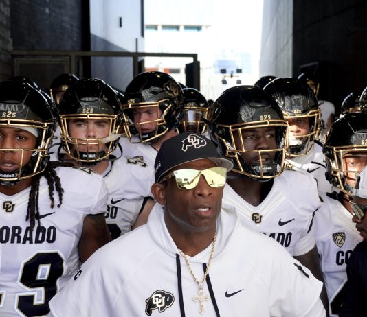 COLRADO HEAD COACH-PRIME-LEADS-TEAM - AP PHOTO