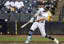 Tampa Bay Rays' Josh Lowe hits a single during the third inning of a baseball game against the Athletics, Wednesday, July 2, 2025, in Tampa, Fla. (AP Photo/Jason Behnken)