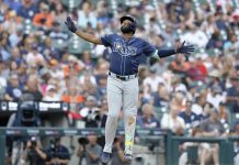 Tampa Bay Rays' Junior Caminero celebrates his home run against the Detroit Tigers during the seventh inning of a baseball game Wednesday, July 9, 2025, in Detroit. (AP Photo/Duane Burleson)
