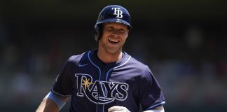 Tampa Bay Rays' Taylor Walls runs the bases after hitting a solo home run during the third inning of a baseball game against the Minnesota Twins, Sunday, July 6, 2025, in Minneapolis. (AP Photo/Abbie Parr)