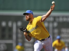 Boston Red Sox's Garrett Crochet delivers a pitch to a Tampa Bay Rays batter in the first inning of a baseball game, Saturday, July 12, 2025, in Boston. (AP Photo/Steven Senne)