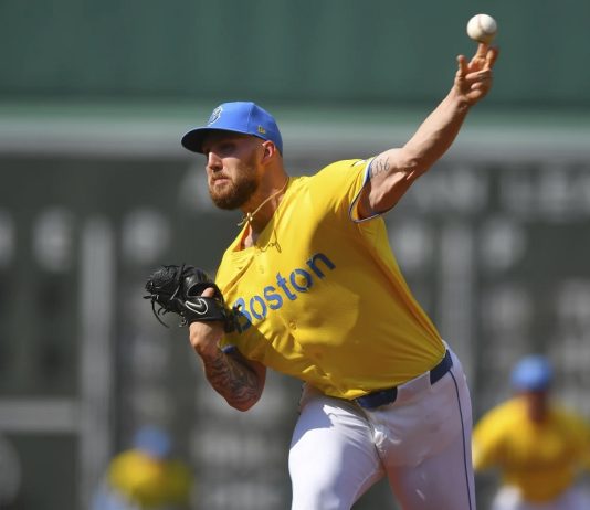 Boston Red Sox's Garrett Crochet delivers a pitch to a Tampa Bay Rays batter in the first inning of a baseball game, Saturday, July 12, 2025, in Boston. (AP Photo/Steven Senne)