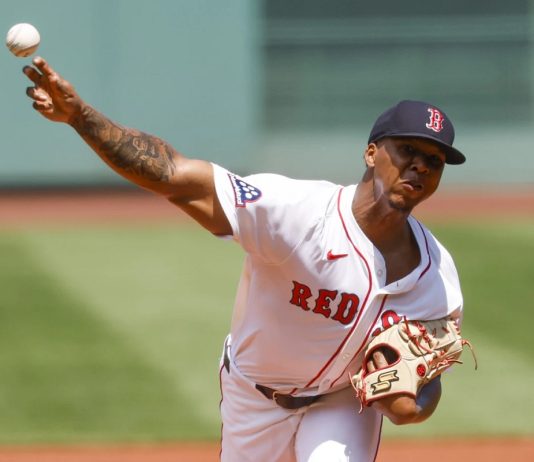Boston Red Sox's Brayan Bello delivers a pitch in the first inning of a baseball game, Sunday, July 13, 2025, in Boston. (AP Photo/Greg M. Cooper)
