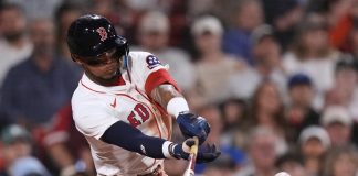 Boston Red Sox's Ceddanne Rafaela connects for a two RBI single against the Tampa Bay Rays during the seventh inning of a baseball game at Fenway Park, Thursday, July 10, 2025, in Boston. (AP Photo/Charles Krupa)