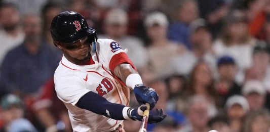 Boston Red Sox's Ceddanne Rafaela connects for a two RBI single against the Tampa Bay Rays during the seventh inning of a baseball game at Fenway Park, Thursday, July 10, 2025, in Boston. (AP Photo/Charles Krupa)