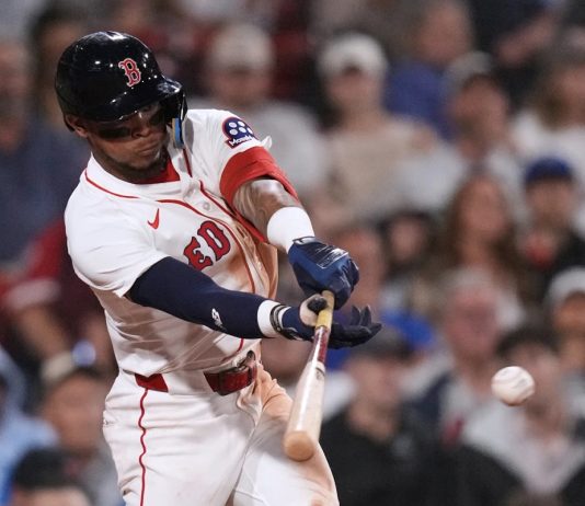 Boston Red Sox's Ceddanne Rafaela connects for a two RBI single against the Tampa Bay Rays during the seventh inning of a baseball game at Fenway Park, Thursday, July 10, 2025, in Boston. (AP Photo/Charles Krupa)