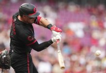 Cincinnati Reds' Tyler Stephenson hits a solo home run during the second inning of a baseball game against the Tampa Bay Rays, Friday, July 25, 2025, in Cincinnati. (AP Photo/Jeff Dean)
