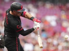 Cincinnati Reds' Tyler Stephenson hits a solo home run during the second inning of a baseball game against the Tampa Bay Rays, Friday, July 25, 2025, in Cincinnati. (AP Photo/Jeff Dean)