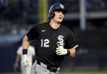 Chicago White Sox's Colson Montgomery rounds the bases after his three-run home run during the second inning of a baseball game against the Tampa Bay Rays Wednesday, July 23, 2025, in Tampa, Fla. (AP Photo/Jason Behnken)