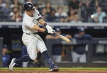 New York Yankees' Anthony Volpe hits a home run during the ninth inning of a baseball game against the Tampa Bay Rays Wednesday, July 30, 2025, in New York. (AP Photo/Frank Franklin II