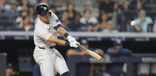 New York Yankees' Anthony Volpe hits a home run during the ninth inning of a baseball game against the Tampa Bay Rays Wednesday, July 30, 2025, in New York. (AP Photo/Frank Franklin II