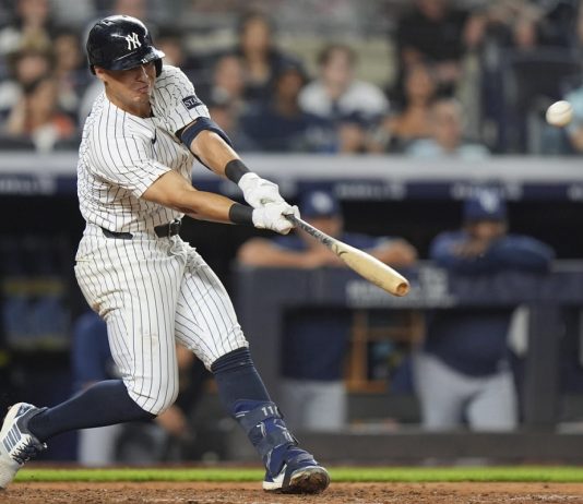 New York Yankees' Anthony Volpe hits a home run during the ninth inning of a baseball game against the Tampa Bay Rays Wednesday, July 30, 2025, in New York. (AP Photo/Frank Franklin II
