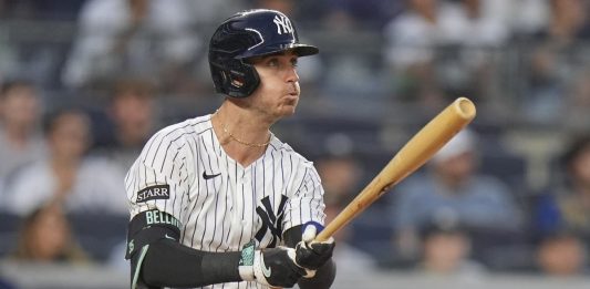 New York Yankees' Cody Bellinger follows through on a three-run home run during the third inning of a baseball game against the Tampa Bay Rays Tuesday, July 29, 2025, in New York. (AP Photo/Frank Franklin II)