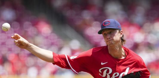 Cincinnati Reds pitcher Brady Singer throws during the third inning of a baseball game against the Tampa Bay Rays, Sunday, July 27, 2025, in Cincinnati. (AP Photo/Jeff Dean)