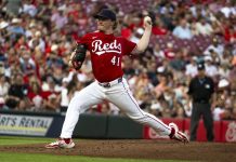 Cincinnati Reds pitcher Andrew Abbott throws during the first inning of a baseball game against the Tampa Bay Rays, Saturday, July 26, 2025, in Cincinnati. (AP Photo/Michael Swensen)