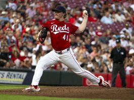 Cincinnati Reds pitcher Andrew Abbott throws during the first inning of a baseball game against the Tampa Bay Rays, Saturday, July 26, 2025, in Cincinnati. (AP Photo/Michael Swensen)