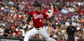 Cincinnati Reds pitcher Andrew Abbott throws during the first inning of a baseball game against the Tampa Bay Rays, Saturday, July 26, 2025, in Cincinnati. (AP Photo/Michael Swensen)
