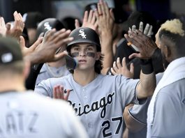 Chicago White Sox's Brooks Baldwin celebrates after his three-run home run during the second inning of a baseball game against the Tampa Bay Rays, Monday, July 21, 2025, in Tampa, Fla. (AP Photo/Jason Behnken)