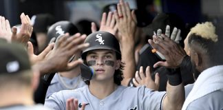 Chicago White Sox's Brooks Baldwin celebrates after his three-run home run during the second inning of a baseball game against the Tampa Bay Rays, Monday, July 21, 2025, in Tampa, Fla. (AP Photo/Jason Behnken)