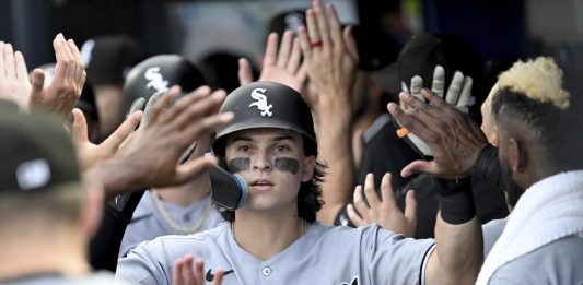 Chicago White Sox's Brooks Baldwin celebrates after his three-run home run during the second inning of a baseball game against the Tampa Bay Rays, Monday, July 21, 2025, in Tampa, Fla. (AP Photo/Jason Behnken)