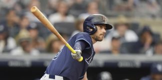 Tampa Bay Rays' Brandon Lowe hits an RBI double during the third inning of a baseball game against the New York Yankees Wednesday, July 30, 2025, in New York. (AP Photo/Frank Franklin II)
