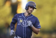 Tampa Bay Rays' Brandon Lowe jogs around the bases after hitting a two-run home run during the second inning of a baseball game against the Athletics, Wednesday, Aug. 13, 2025, in West Sacramento, Calif. (AP Photo/Scott Marshall)