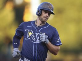 Tampa Bay Rays' Brandon Lowe jogs around the bases after hitting a two-run home run during the second inning of a baseball game against the Athletics, Wednesday, Aug. 13, 2025, in West Sacramento, Calif. (AP Photo/Scott Marshall)